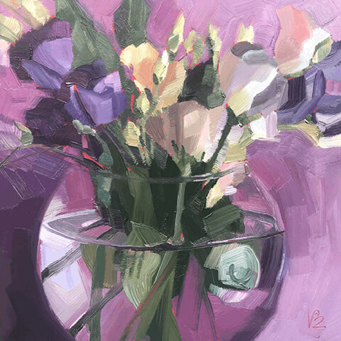 lucy burton pink and purple flowers in clear glass vase