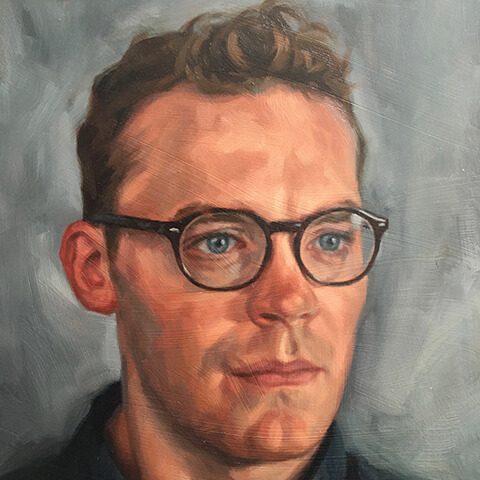 Mark Fennell - young man with glasses and light brown hair